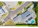 An aerial view featuring a modern home design with solar panels and backyard pool at 4708 N 41St Pl, Phoenix, AZ 85018
