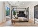 Modern bedroom design with unique bed frame, stylish accents, and natural light at 4708 N 41St Pl, Phoenix, AZ 85018