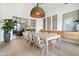 Dining room with table, seating for eight and designer lighting with wine storage at 4708 N 41St Pl, Phoenix, AZ 85018