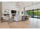 Bright living space with fireplace, entertainment center, bar, and sliding doors to backyard at 4708 N 41St Pl, Phoenix, AZ 85018
