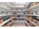 Walk-in pantry with ample shelving and storage baskets for organized convenience at 4708 N 41St Pl, Phoenix, AZ 85018