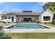 Back exterior view of home highlighting the beautiful pool and outdoor living spaces at 4708 N 41St Pl, Phoenix, AZ 85018