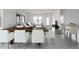 Bright and airy open-concept dining and living area with modern decor at 47249 W Coe St, Maricopa, AZ 85139