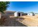 Large backyard features a storage shed with a block wall surrounding the property at 4740 W Bloomfield Rd, Glendale, AZ 85304