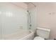 Full bathroom featuring a tub with shower, tile, and toilet at 4740 W Bloomfield Rd, Glendale, AZ 85304