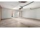 Spacious garage with high ceilings and concrete floor at 4740 W Bloomfield Rd, Glendale, AZ 85304