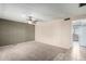 Living room with neutral walls, tiled floor, a ceiling fan, and staircase to the living area at 4740 W Bloomfield Rd, Glendale, AZ 85304