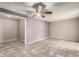 Living room with neutral walls, tile flooring, ceiling fan, and good area for entertaining at 4740 W Bloomfield Rd, Glendale, AZ 85304