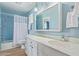 Bathroom with blue tile and updated vanity at 5204 E Colby St, Mesa, AZ 85205