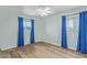 Bedroom featuring hardwood floors, fresh paint, and natural lighting at 5204 E Colby St, Mesa, AZ 85205