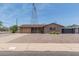 Charming home with a well-maintained front yard, driveway, and garage at 5204 E Colby St, Mesa, AZ 85205
