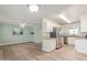 Open floor plan showcasing a modern kitchen with stainless steel appliances at 5204 E Colby St, Mesa, AZ 85205