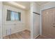 Storage room with fresh paint and natural light at 5204 E Colby St, Mesa, AZ 85205