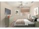 Comfortable bedroom with stylish furnishings, soft lighting, and inviting atmosphere for relaxing at 6317 E Colby St, Mesa, AZ 85205