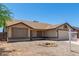 Inviting home exterior featuring desert landscaping, neutral tones, and a welcoming facade at 6317 E Colby St, Mesa, AZ 85205