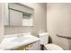 Bathroom with sink, mirror, toilet, and shower in the background at 6426 W Mulberry Dr, Phoenix, AZ 85033