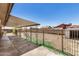 View of a large covered patio and fenced backyard at 6426 W Mulberry Dr, Phoenix, AZ 85033