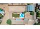 Aerial view of the backyard of a home featuring a large dirt area and a pool and patio at 7101 E Cholla St, Scottsdale, AZ 85254