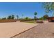Expansive backyard featuring a potential horse property, hot tub, and desert landscaping at 7101 E Cholla St, Scottsdale, AZ 85254