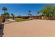 Large backyard featuring desert landscaping, swimming pool, and covered patio space at 7101 E Cholla St, Scottsdale, AZ 85254