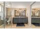 Elegant bathroom with double sinks, granite countertops, and glass shower at 7101 E Cholla St, Scottsdale, AZ 85254