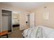 Bedroom with sliding closet doors and neutral finishes at 7101 E Cholla St, Scottsdale, AZ 85254