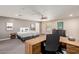 Large bedroom with a desk, neutral colors, and ceiling fan at 7101 E Cholla St, Scottsdale, AZ 85254