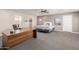 Large bedroom with a desk, neutral colors and open floor plan at 7101 E Cholla St, Scottsdale, AZ 85254