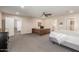 Large bedroom with a desk and neutral colors at 7101 E Cholla St, Scottsdale, AZ 85254