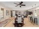 Stylish dining area connecting the kitchen, living room and dining areas with tile floors at 7101 E Cholla St, Scottsdale, AZ 85254