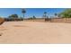 A lot with horse corrals, a gated entry, and a spacious area for animals at 7101 E Cholla St, Scottsdale, AZ 85254