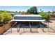Well-maintained horse facilities with a large metal shelter and ample space for horses to roam at 7101 E Cholla St, Scottsdale, AZ 85254