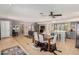 Open floor plan with tile floors and grey paint showing kitchen, dining, and living area at 7101 E Cholla St, Scottsdale, AZ 85254