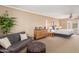 Spacious bedroom featuring sitting area, brick walls, and ample natural light at 7101 E Cholla St, Scottsdale, AZ 85254