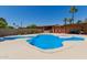 Stunning backyard pool with a unique design and ample space for outdoor relaxation at 7101 E Cholla St, Scottsdale, AZ 85254