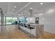 Modern kitchen boasts a large island with bar seating, state-of-the-art appliances, and exterior views at 7117 E Rancho Vista Dr # 6007, Scottsdale, AZ 85251