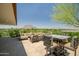 Inviting outdoor patio with cushioned seating and serene views of the nearby mountains at 7117 E Rancho Vista Dr # 6007, Scottsdale, AZ 85251