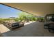 Expansive patio featuring outdoor seating, dining area, and lush greenery, ideal for relaxation at 7117 E Rancho Vista Dr # 6007, Scottsdale, AZ 85251