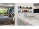 Bright bathroom with double vanity, storage, and access to the main bedroom at 7167 E Rancho Vista Dr # 3002, Scottsdale, AZ 85251