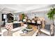Spacious open-concept living room flows into kitchen, with modern decor and abundant natural light at 7167 E Rancho Vista Dr # 3002, Scottsdale, AZ 85251