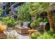 Outdoor seating with modern fire pit and mature landscaping at 7167 E Rancho Vista Dr # 3002, Scottsdale, AZ 85251