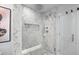 Bright shower featuring marble-style tile, rainfall shower head, and built-in shower niche at 7167 E Rancho Vista Dr # 3002, Scottsdale, AZ 85251
