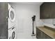 Efficient laundry room with modern washer, dryer, and storage space for convenience at 7180 E Kierland Blvd # 916, Scottsdale, AZ 85254