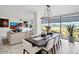 Open living and dining room features an expansive seating area with a view at 7180 E Kierland Blvd # 916, Scottsdale, AZ 85254