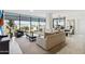 Bright living room features an expansive seating area and large windows with a beautiful view at 7180 E Kierland Blvd # 916, Scottsdale, AZ 85254