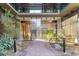 Inviting building entrance with modern glass doors, landscaping and a stylish walkway at 7180 E Kierland Blvd # 916, Scottsdale, AZ 85254