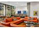 Stylish lounge area with comfortable seating, TV screens, and a bar for socializing at 7180 E Kierland Blvd # 916, Scottsdale, AZ 85254