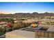 Rooftop terrace with lounge area, fire pit, and panoramic views of the city and mountains at 7180 E Kierland Blvd # 916, Scottsdale, AZ 85254