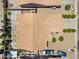 Aerial shot showcasing the layout of the house, the backyard, and the surrounding neighborhood at 7551 W Pasadena Ave, Glendale, AZ 85303