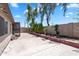 Paver patio and landscaping with mature trees in a fenced backyard at 7551 W Pasadena Ave, Glendale, AZ 85303